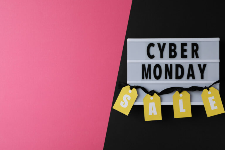 Cyber monday message with packages on dark background